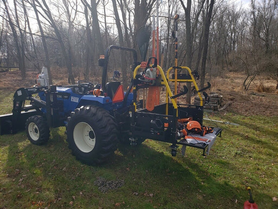 New Holland tractor using the Ultimate rack with tool holders - carry brush cutter , whipper snipper, chainsaw , rake , starpicket, shovel in tractor carry all use as ute tub or tray