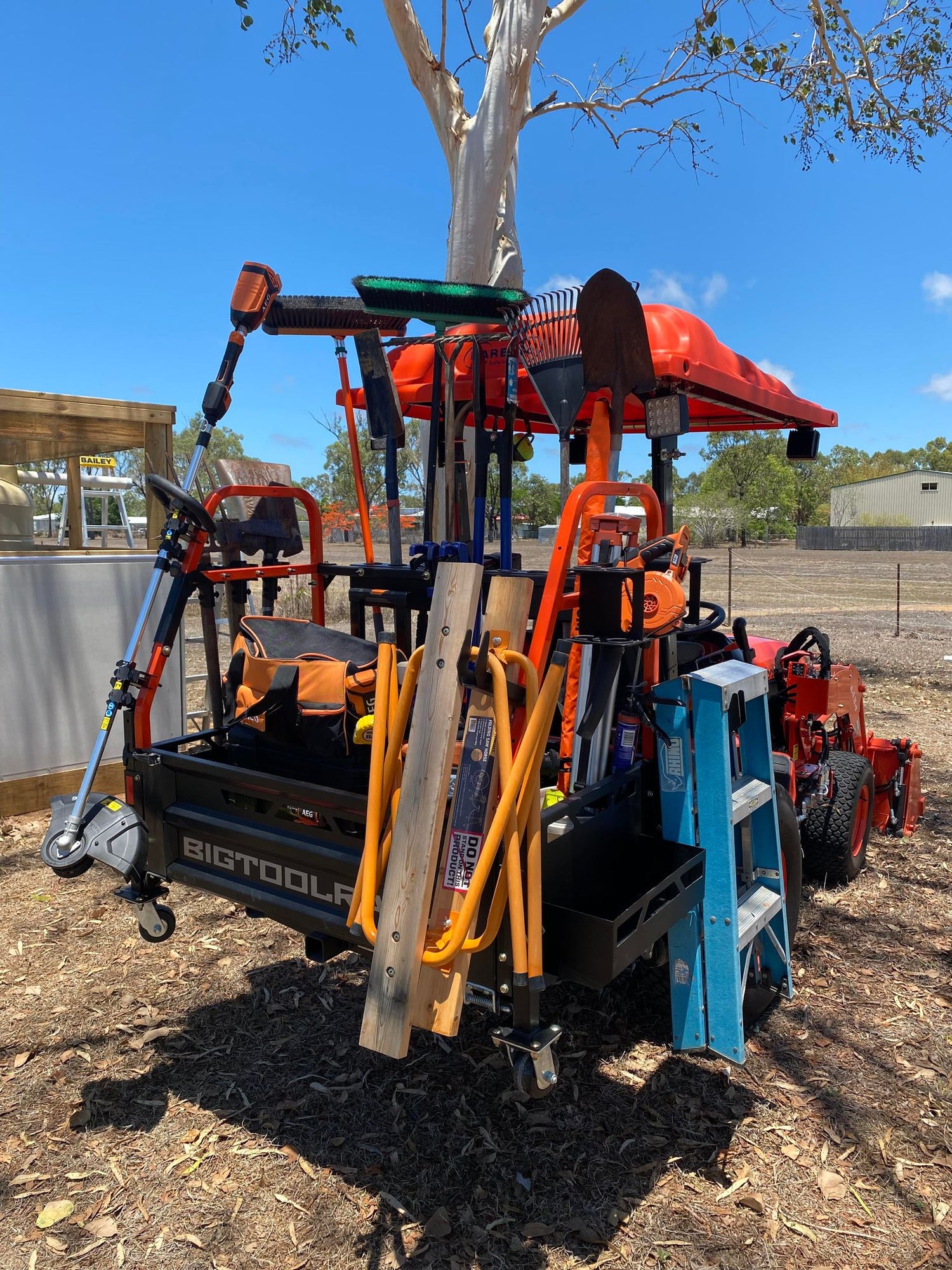 Kubota compact tractor with loader carrying the ultimate rack carry all carry all in orange - carry all your tools, jerry cans, and tractor accessories 