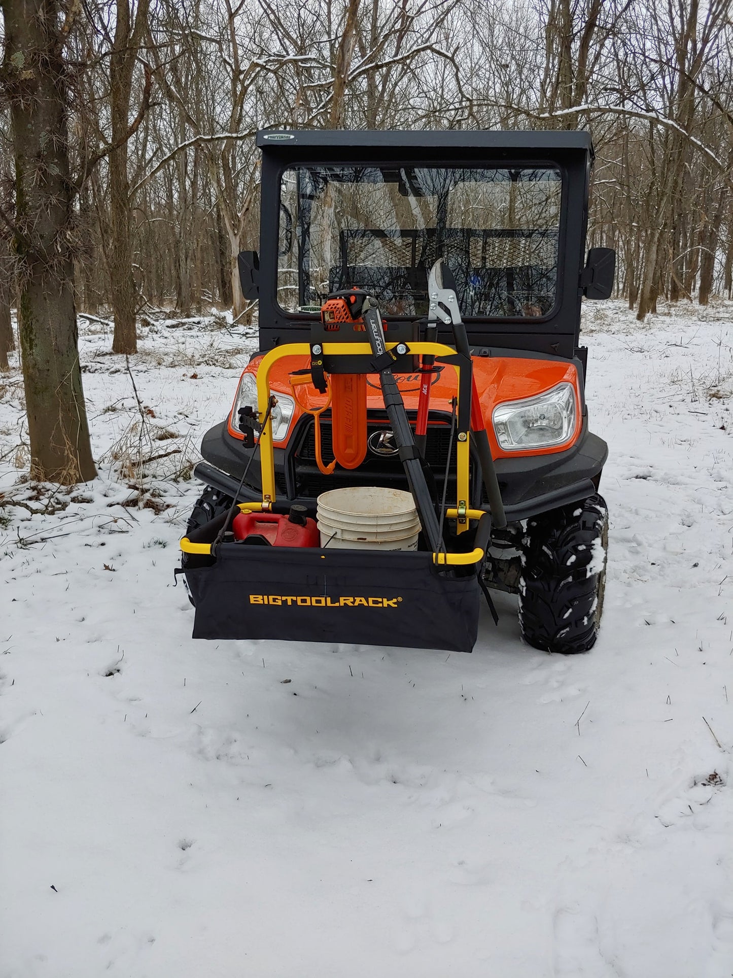 Big Tool Rack Yard Rack storage unit for mowers atv utv from 626 Group in Australia on Kubota UTV working in snow - add extra storage to your Kubota RTV UTV ATV - models like RTV520 RTV-XG850 RTV-X900 RTV-X1100 RTV-X1120 and RTV-X1140 = fold up storage carry all unit for all models - tow ball mounted - also popular on all the Polaris models like the Ranger SP 530 SP 570 and Ranger SP 570 premium - large models like Polaris Ranger Crew 1000 and XP1000 & kinetic