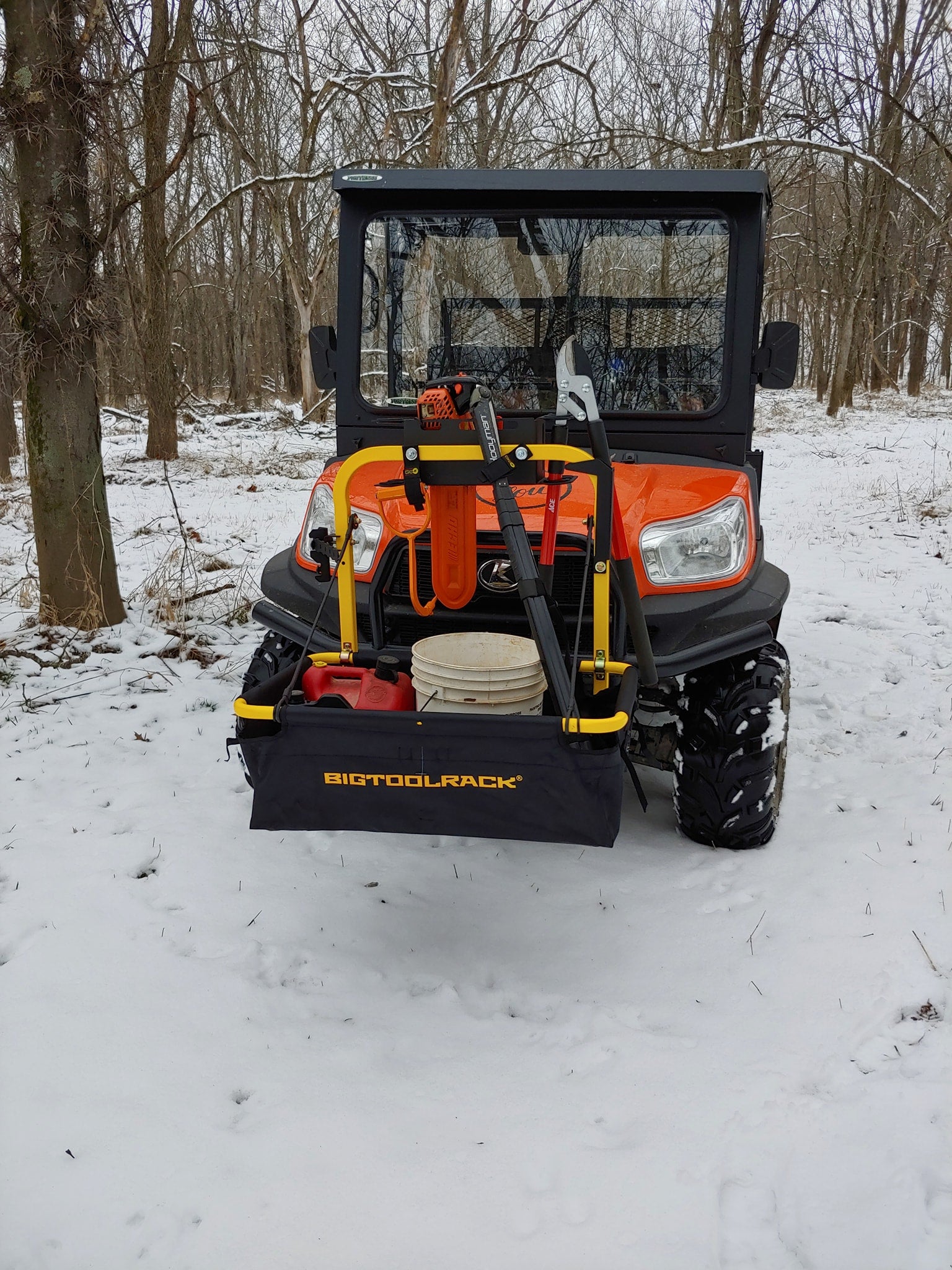 Big Tool Rack Yard Rack storage unit for mowers atv utv from 626 Group in Australia on Kubota UTV working in snow - add extra storage to your Kubota RTV UTV ATV - models like RTV520 RTV-XG850 RTV-X900 RTV-X1100 RTV-X1120 and RTV-X1140 = fold up storage carry all unit for all models - tow ball mounted - also popular on all the Polaris models like the Ranger SP 530 SP 570 and Ranger SP 570 premium - large models like Polaris Ranger Crew 1000 and XP1000 & kinetic