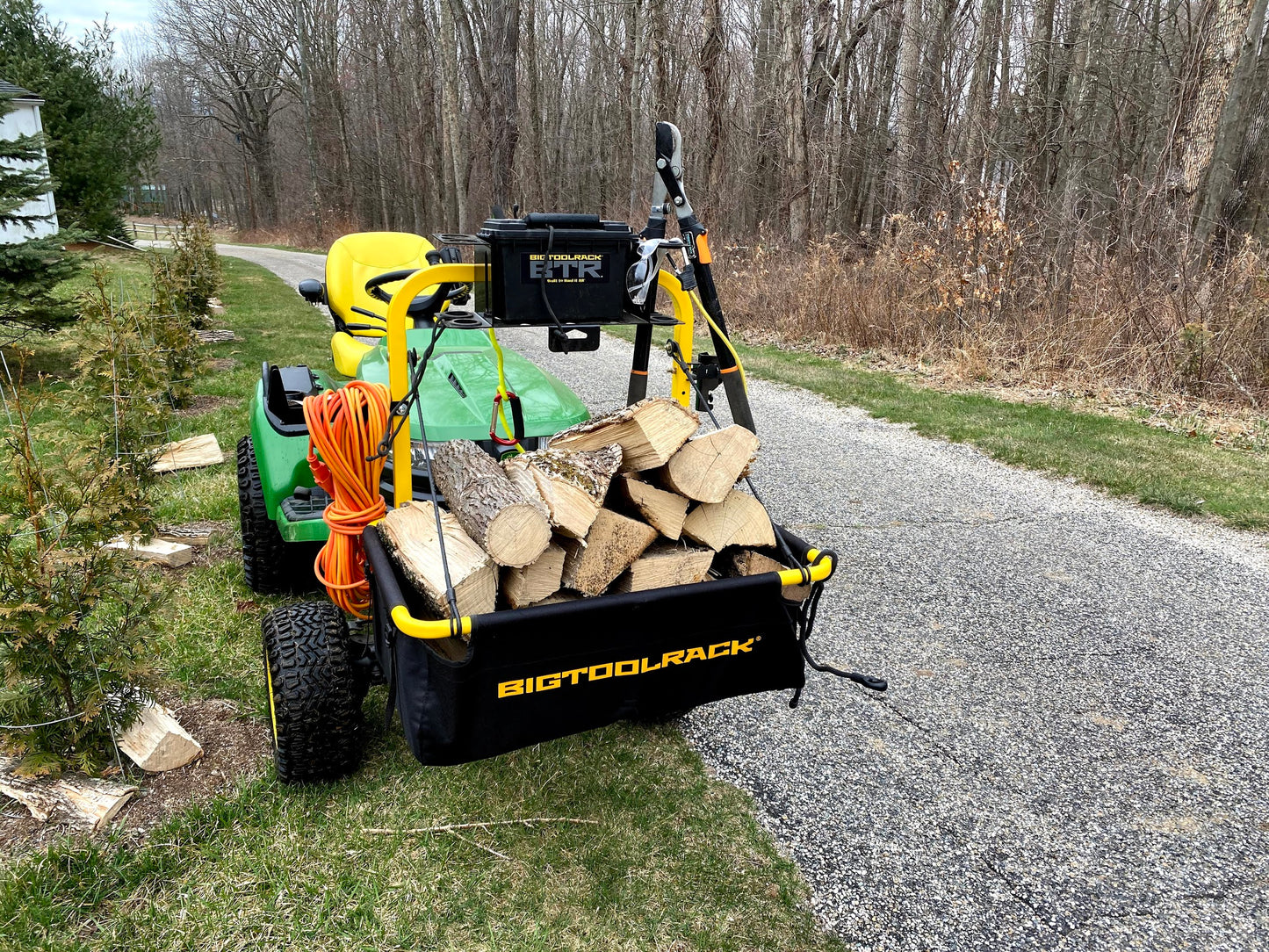 Big Tool Rack Yard Rack storage unit for mowers atv utv from 626 Group in Australia loaded with timber on front of john Deere ride on - popular on most john deere ride on models like X350 X350R X354 X380 X384 X570 X580 X584 X590 X730 X734 X738 X739 X750 X754 and even X758 - increase your john deere ride on carry capacity with the storage unit carry all from big tool rack. Carry tools / implements and feed around your hobby farm 